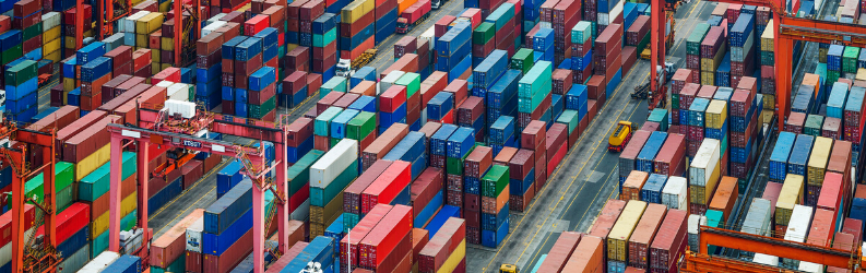 Aerial view of a container yard at port.